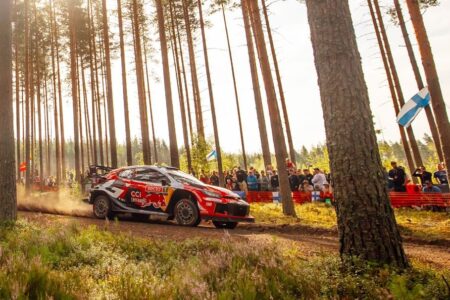 Ogier in command after torrential rain shakes up order