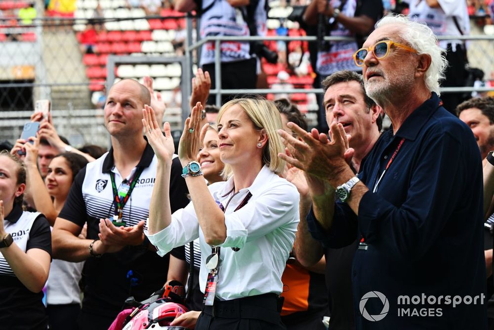 Susie Wolff, Managing Director, F1 Academy, and Flavio Briatore, Executive Advisor, Alpine F1, watch the podium ceremony