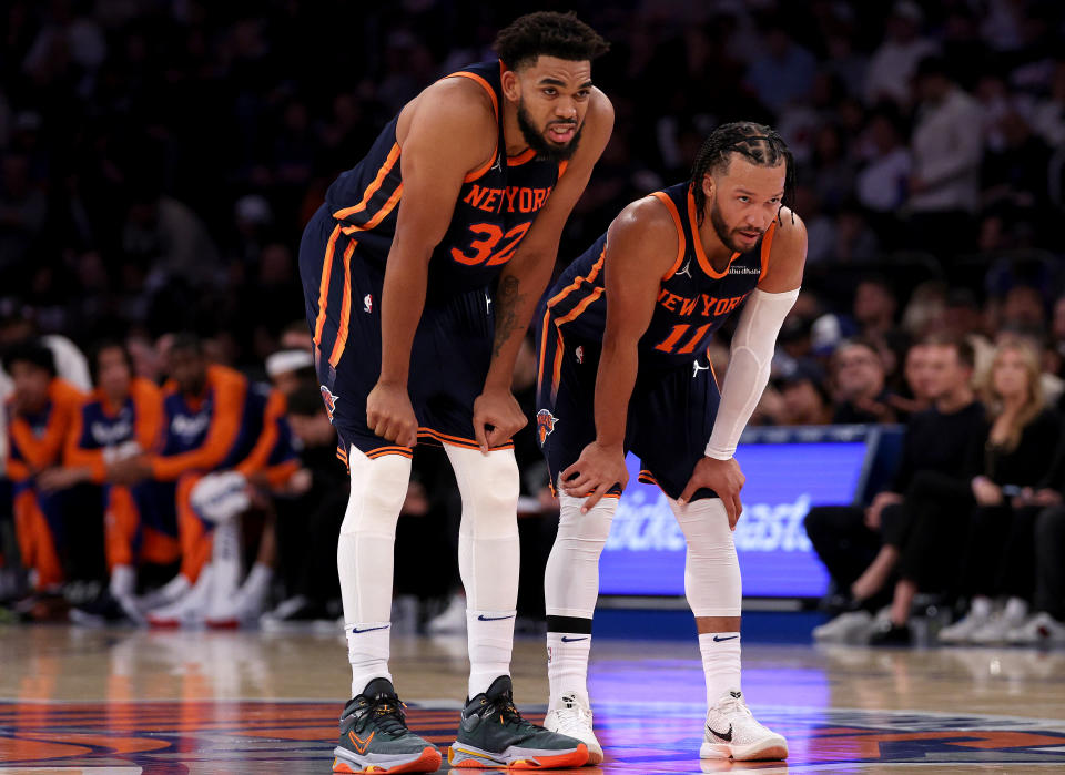 NEW YORK, NEW YORK - NOVEMBER 08:  Karl-Anthony Towns #32 and Jalen Brunson #11 of the New York Knicks talk during a free throw by a teammate in the second half against the Milwaukee Bucks at Madison Square Garden on November 08, 2024 in New York City. NOTE TO USER: User expressly acknowledges and agrees that, by downloading and or using this photograph, User is consenting to the terms and conditions of the Getty Images License Agreement. (Photo by Elsa/Getty Images)