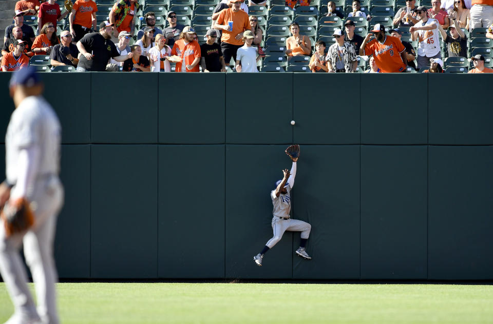 Rays outfielder Randy Arozarena can't make the catch against the large left field wall at Camden Yards, which will now be moved back in. (Randy Litzinger/Icon Sportswire via Getty Images)