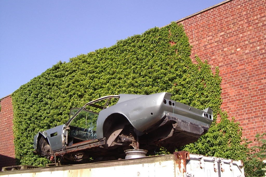 Written-off body from badly
shunted road car was rebuilt using parts cannibalised 
from a DBS racer wrecked at Brands 