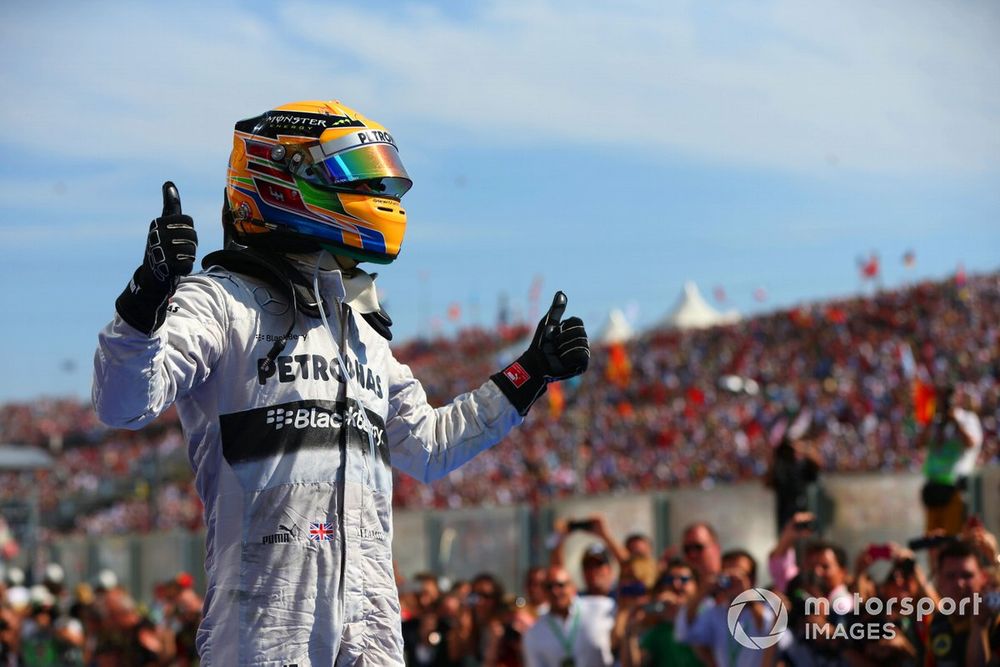 Hungaroring, Budapest, Hungary
28th July 2013
Lewis Hamilton, Mercedes AMG, 1st position, celebrates on arrival in Parc Ferme
World Copyright: Andy Hone/LAT Photographic
ref: Digital Image HONZ4772