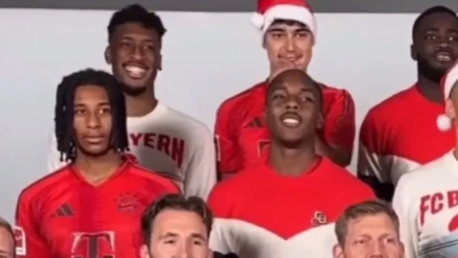 Michael Olise looks incredibly awkward as Bayern Munich stars get into Christmas mood by singing Jingle Bells