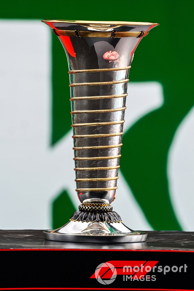 The face of Lewis Hamilton, Mercedes-AMG F1, reflected in the World Championship trophy as he heads towards his 7th World Championship