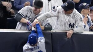 MLB bans two fans who grabbed LA Dodgers’ Betts