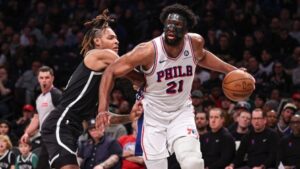 Shorthanded Nets fall to 76ers, 123-94