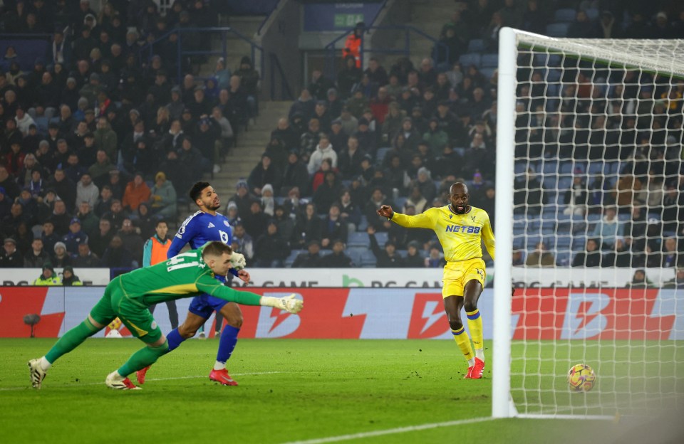 Jean-Philippe Mateta scoring a goal during a soccer match.