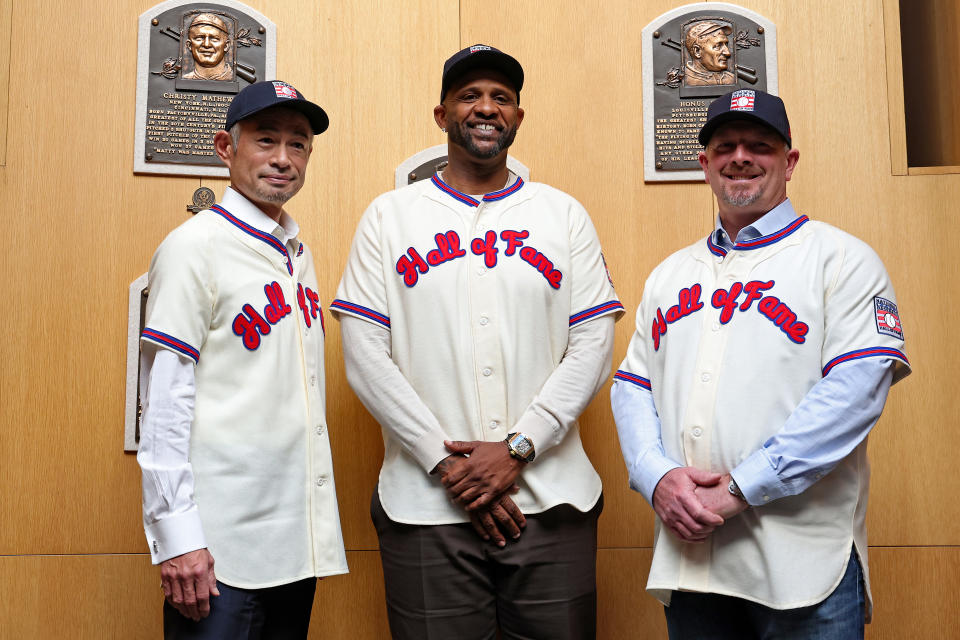 Ichiro Suzuki, C.C. Sabathia and Billy Wagner pose for a photo in the Plaque Gallery. (New York Yankees/Getty Images)