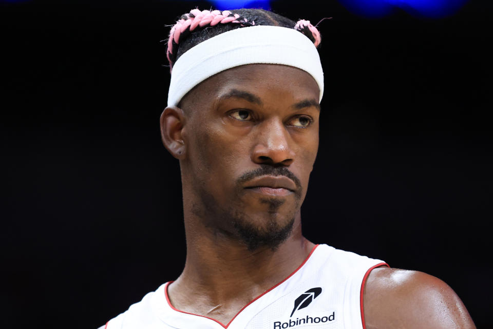 MIAMI, FLORIDA - JANUARY 01: Jimmy Butler #22 of the Miami Heat looks on against the New Orleans Pelicans during the second quarter of the game at Kaseya Center on January 01, 2025 in Miami, Florida. NOTE TO USER: User expressly acknowledges and agrees that, by downloading and or using this photograph, User is consenting to the terms and conditions of the Getty Images License Agreement. (Photo by Megan Briggs/Getty Images)