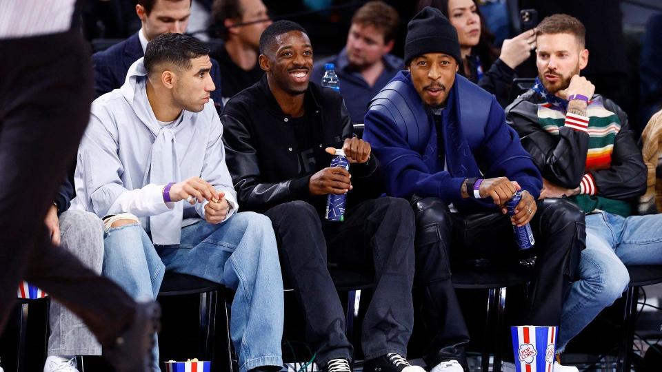 Achraf Hakimi, Ousmane Dembele and Presnel Kimpembe watching basketball