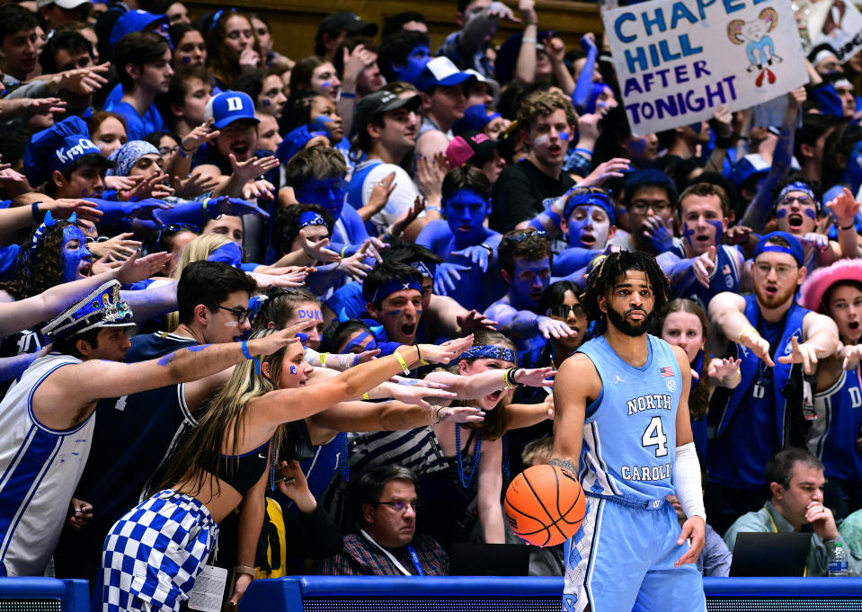 The Cameron Crazies taunt RJ Davis during last year's game in Durham. (Grant Halverson/Getty Images)