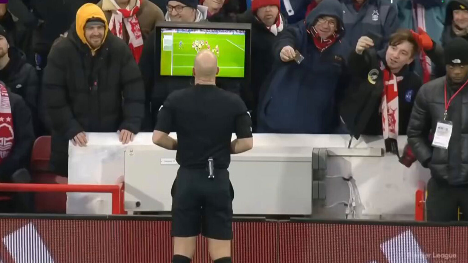 Moment Nottingham Forest fans ‘try to bribe Anthony Taylor’ during VAR check as hilarious footage goes viral