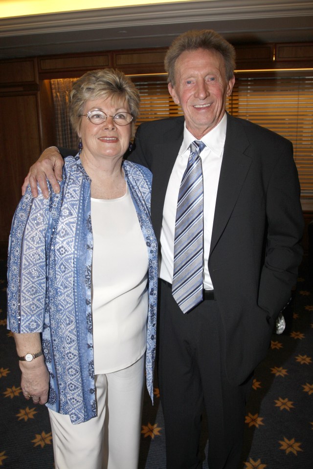 Denis Law and his wife Di at an event.