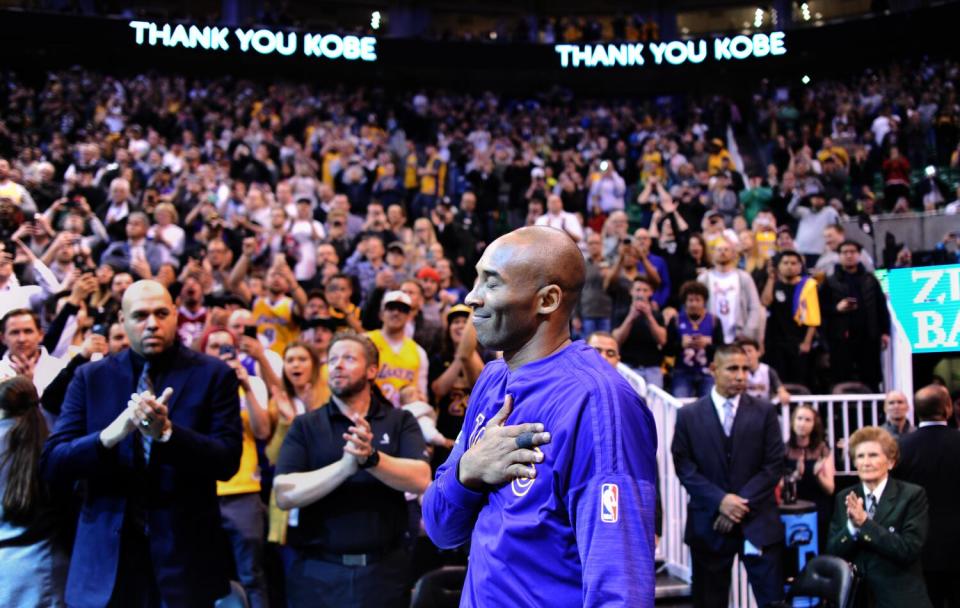 Lakers star Kobe Bryant receives a standing ovation as he is introduced before a game against the Utah Jazz.