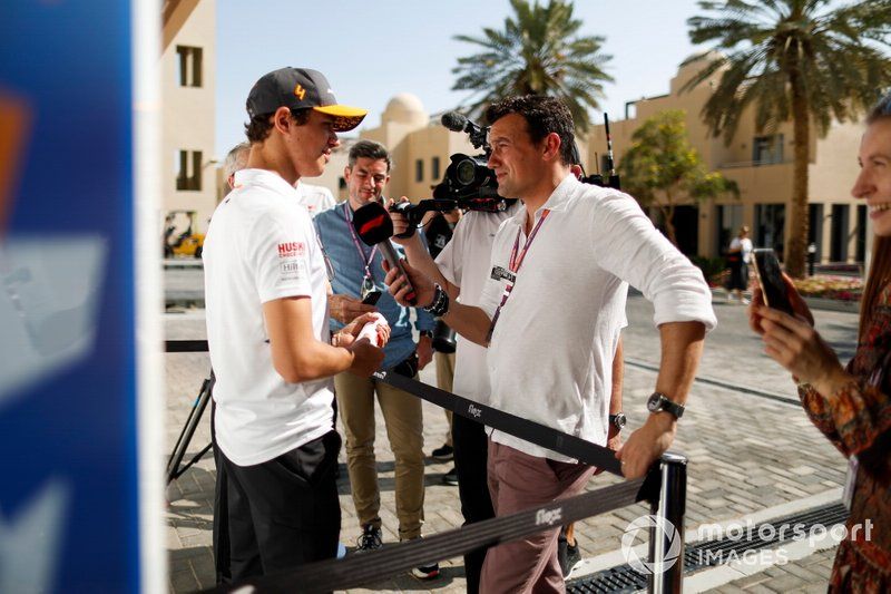 Lando Norris, McLaren, talks to Will Buxton