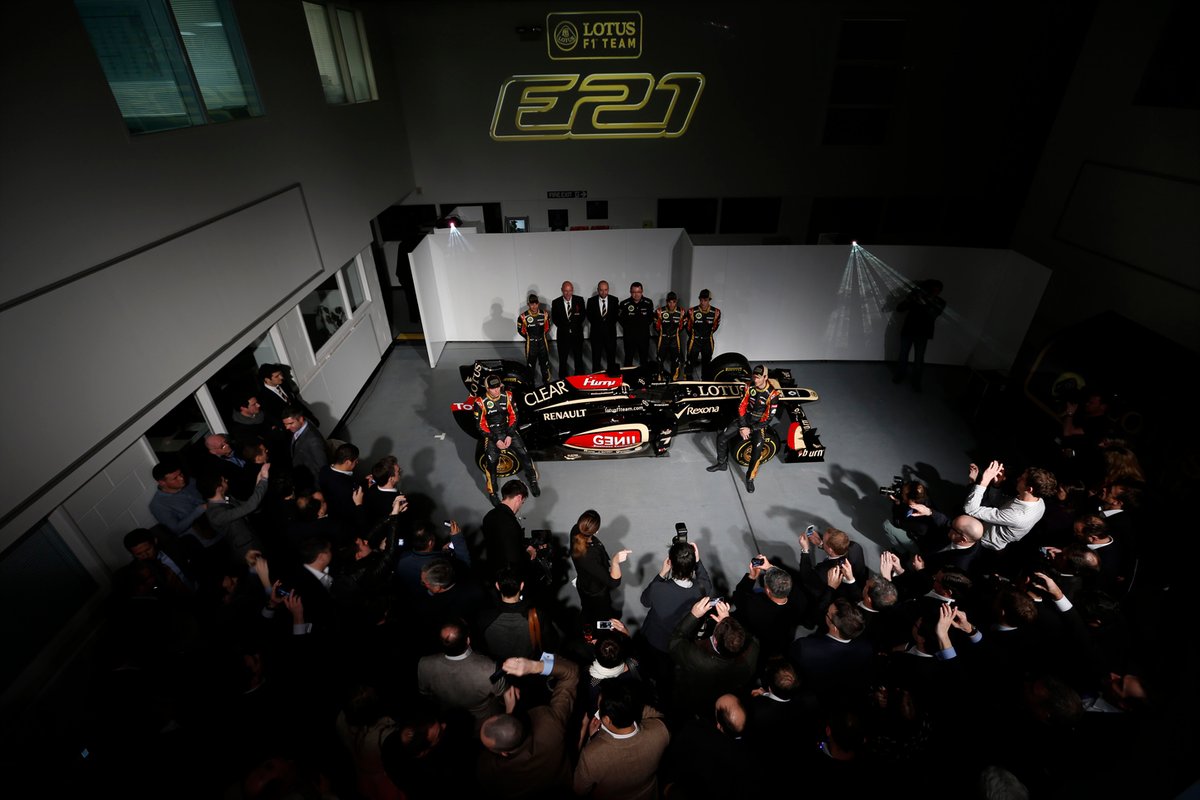 Nicolas Prost, Development Driver, Lotus F1 Team, Davide Valsecchi, Third Driver, Lotus F1 Team, Kimi Raikkonen, Driver, Lotus F1 Team, Gerard Lopez, Chairman, Lotus F1 Team, Eric Boullier, Team Principal, Lotus F1 Team, Romain Grosjean, Driver, Lotus F1 Team, and Jerome D’Ambrosio, Reserve Driver, Lotus F1 Team with the E21