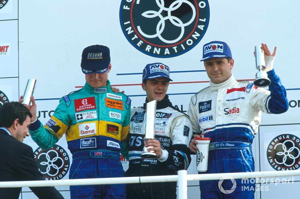 Flanked by David Coulthard and Gil de Ferran after winning at Silverstone, Lagorce's late season stumbles opened the door for Boullion