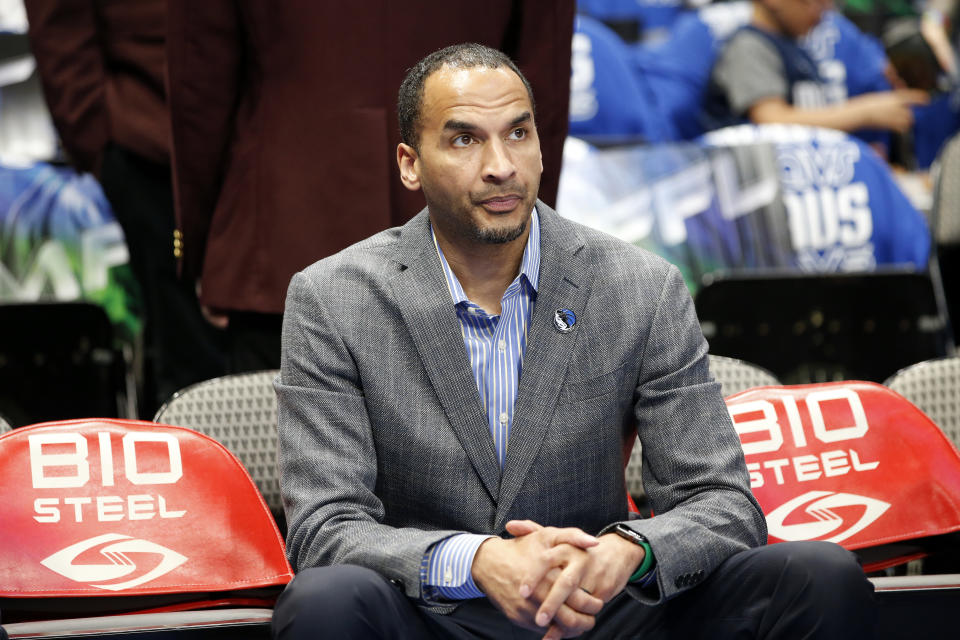 DALLAS, TEXAS - APRIL 10: Nico Harrison of the Dallas Mavericks watches warmups before the game against the San Antonio Spurs at American Airlines Center on April 10, 2022 in Dallas, Texas. NOTE TO USER: User expressly acknowledges and agrees that, by downloading and or using this photograph, User is consenting to the terms and conditions of the Getty Images License Agreement.  (Photo by Tim Heitman/Getty Images)