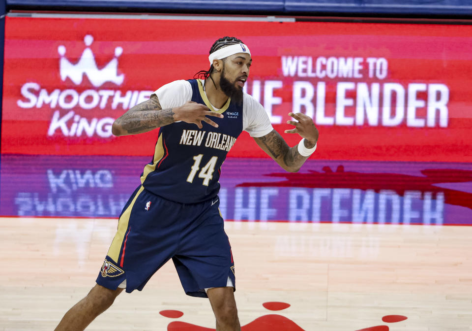 NEW ORLEANS, LOUISIANA - DECEMBER 5:  Brandon Ingram #14 of the New Orleans Pelicans reacts after scoring on a three point basket against the Phoenix Suns during the second half of a game at the Smoothie King Center on December 5, 2024 in New Orleans, Louisiana. NOTE TO USER: User expressly acknowledges and agrees that, by downloading and or using this photograph, User is consenting to the terms and conditions of the Getty Images License Agreement. (Photo by Derick E. Hingle/Getty Images)