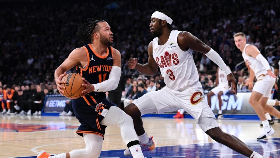 New York Knicks guard Jalen Brunson (11) drives to the basket against Cleveland Cavaliers guard Caris LeVert (3) during the first half at Madison Square Garden.