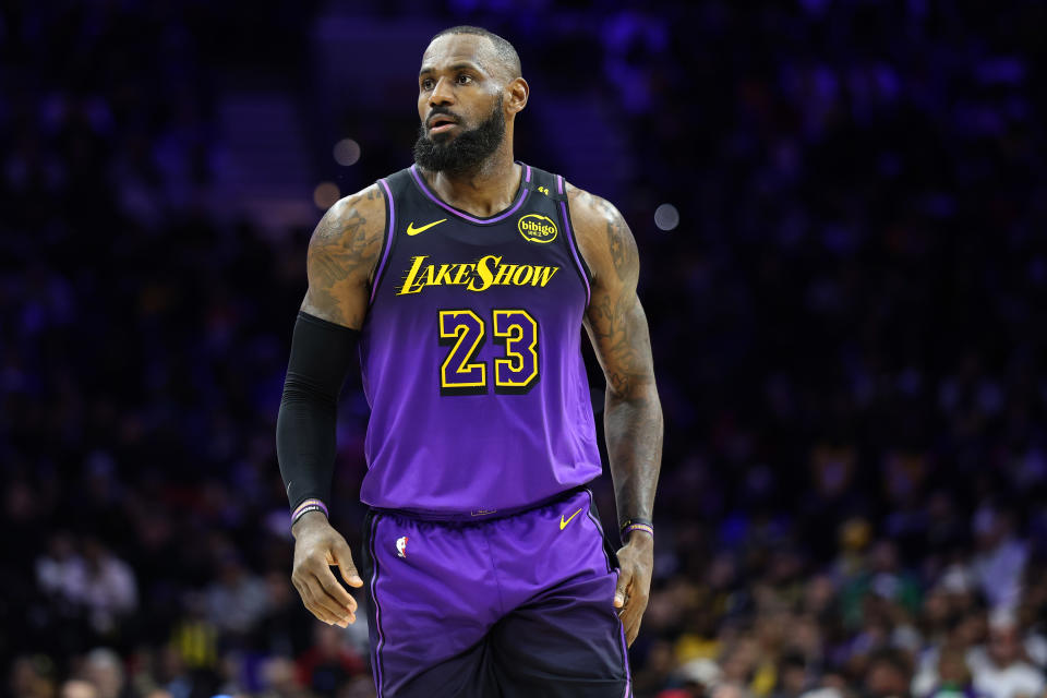 PHILADELPHIA, PENNSYLVANIA - JANUARY 28: LeBron James #23 of the Los Angeles Lakers looks on during a game against the Philadelphia 76ers at the Wells Fargo Center on January 28, 2025 in Philadelphia, Pennsylvania. NOTE TO USER: User expressly acknowledges and agrees that, by downloading and or using this photograph, User is consenting to the terms and conditions of the Getty Images License Agreement. (Photo by Emilee Chinn/Getty Images)