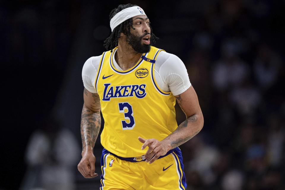 Los Angeles Lakers forward Anthony Davis (3) looks on during the first half of an NBA basketball game against the Charlotte Hornets Monday, Jan. 27, 2025, in Charlotte, N.C. (AP Photo/Jacob Kupferman)