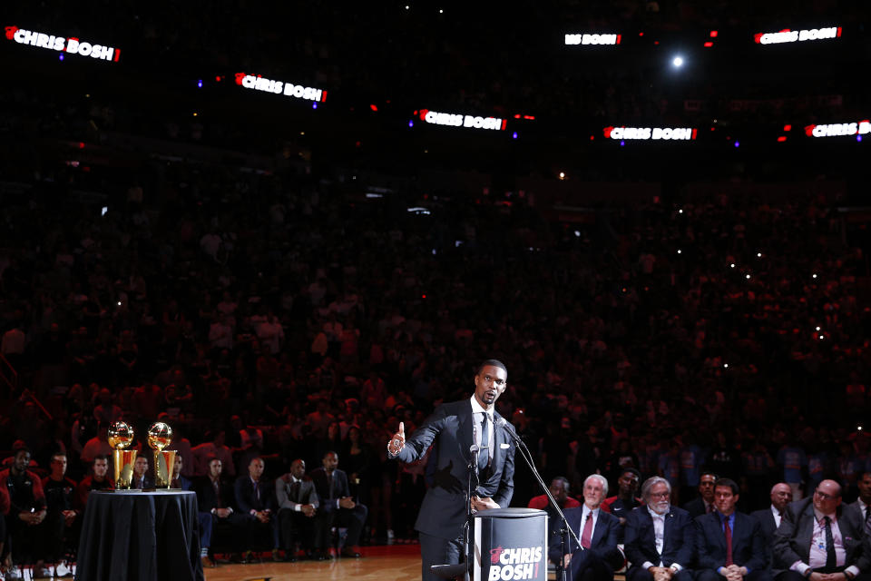 MIAMI, FLORIDA - MARCH 26:  Former Miami Heat player Chris Bosh addresses the crowd during his jersey retirement ceremony at halftime of the game between the Miami Heat and the Orlando Magic at American Airlines Arena on March 26, 2019 in Miami, Florida. NOTE TO USER: User expressly acknowledges and agrees that, by downloading and or using this photograph, User is consenting to the terms and conditions of the Getty Images License Agreement. (Photo by Michael Reaves/Getty Images)