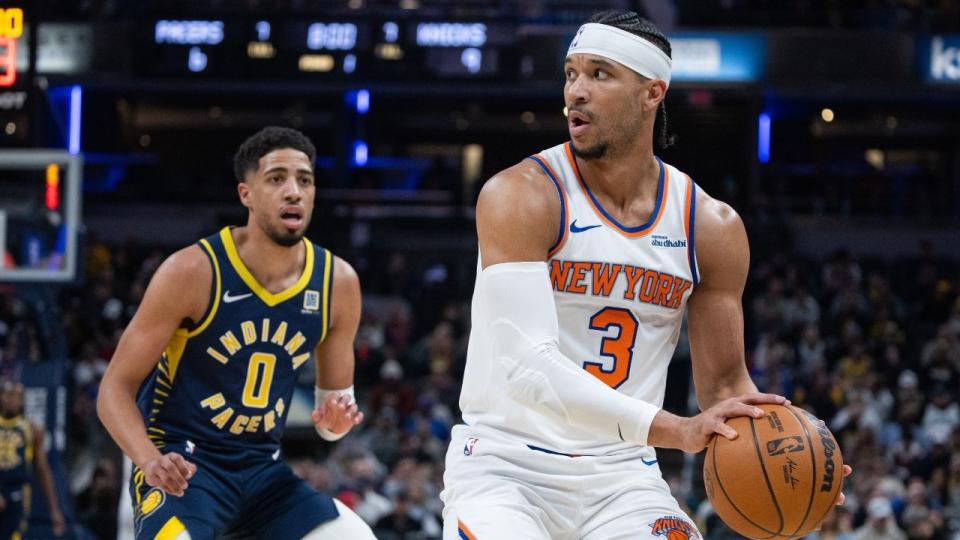 New York Knicks guard Josh Hart (3) holds the ball while Indiana Pacers guard Tyrese Haliburton (0) defends in the first half at Gainbridge Fieldhouse