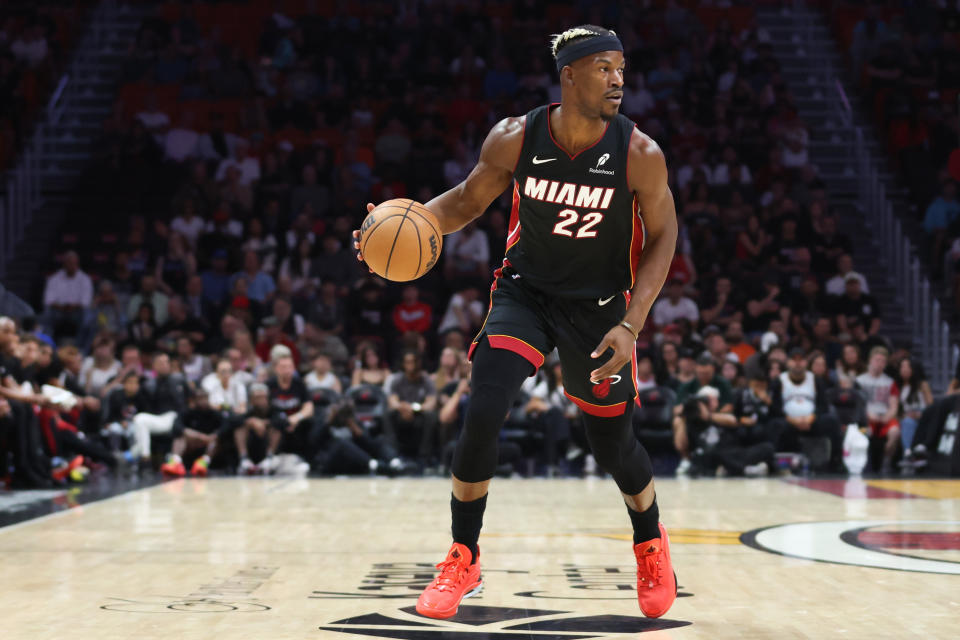 MIAMI, FLORIDA - JANUARY 19: Jimmy Butler #22 of the Miami Heat dribbles the ball against the San Antonio Spurs during the first quarter of the game at Kaseya Center on January 19, 2025 in Miami, Florida. NOTE TO USER: User expressly acknowledges and agrees that, by downloading and or using this photograph, User is consenting to the terms and conditions of the Getty Images License Agreement. (Photo by Megan Briggs/Getty Images)