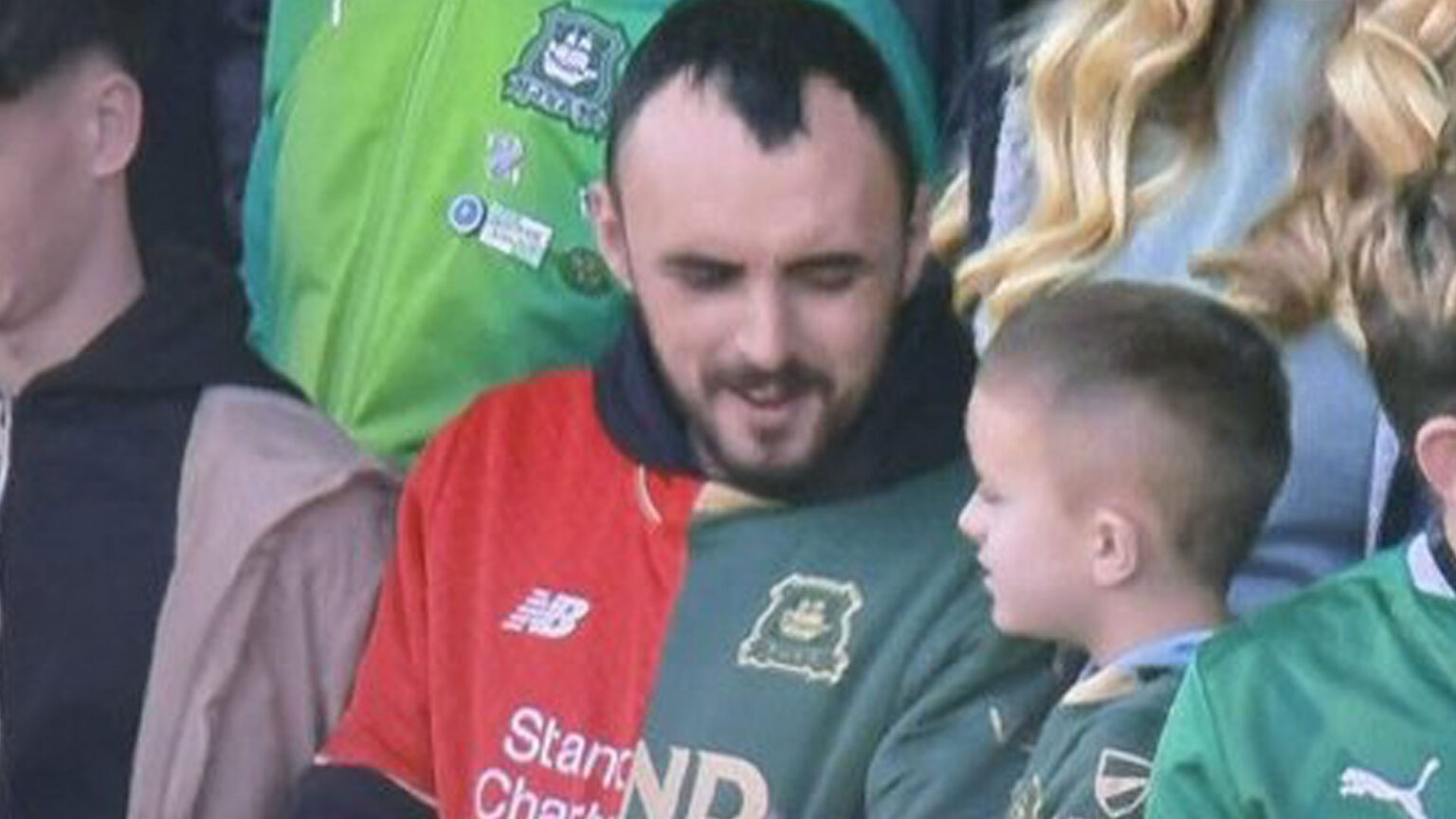 Fans say ‘straight to jail’ as supporter is spotted wearing half-and-half SHIRT for Plymouth vs Liverpool clash