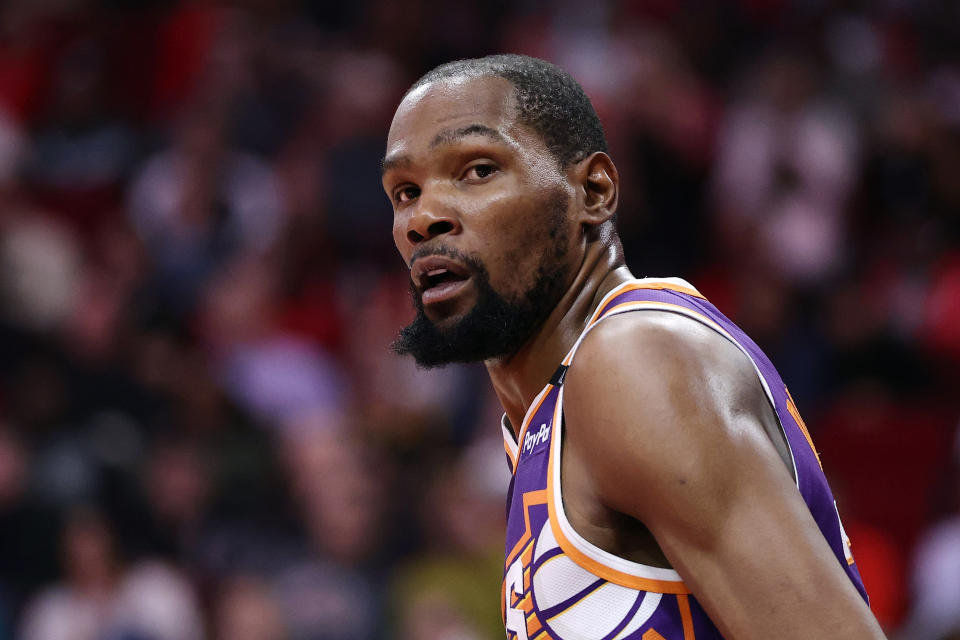 HOUSTON, TEXAS - FEBRUARY 12: Kevin Durant #35 of the Phoenix Suns looks on against the Houston Rockets during the second half at Toyota Center on February 12, 2025 in Houston, Texas. NOTE TO USER: User expressly acknowledges and agrees that, by downloading and or using this photograph, User is consenting to the terms and conditions of the Getty Images License Agreement. (Photo by Alex Slitz/Getty Images)