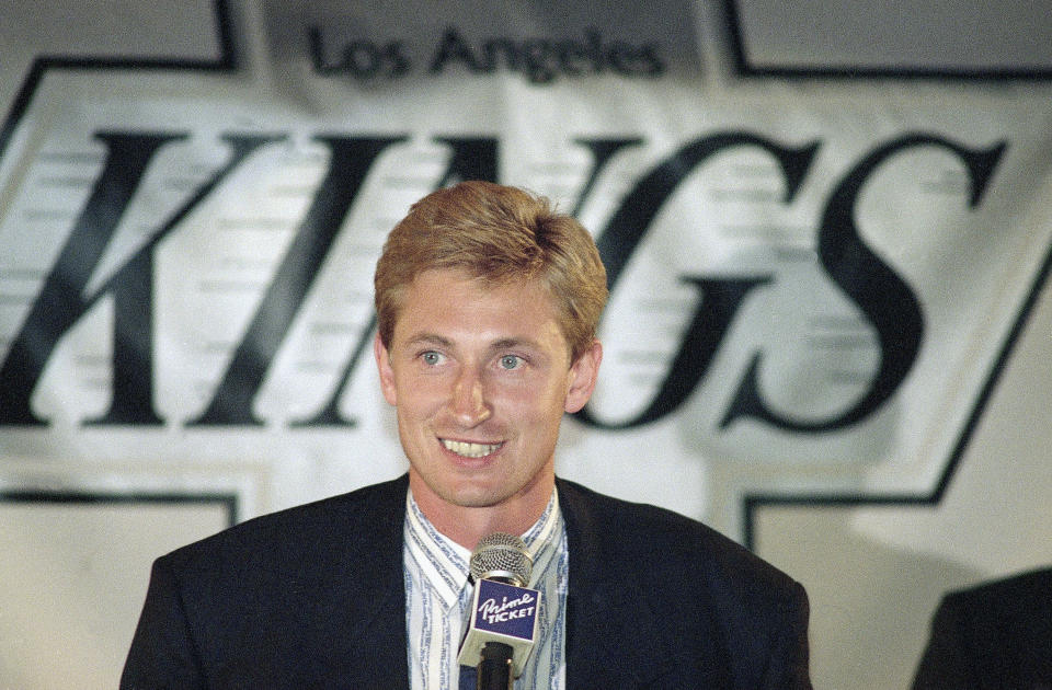 Wayne Gretzky speaks at a press conference in Los Angeles, Aug. 9, 1988, after being traded to the L.A. Kings from the Edmonton Oilers. (AP Photo/Reed Saxon)