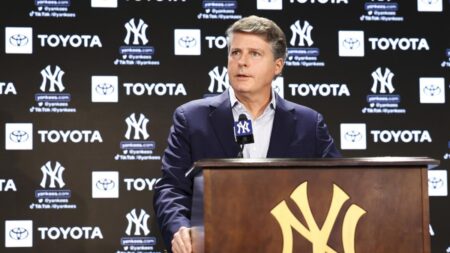 Yankees owner Hal Steinbrenner may support a salary cap proposal tied to payroll minimum