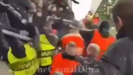 Watch as notorious Ferencvaros ultras disguise themselves as STEWARDS to launch brutal brawl on rival AZ Alkmaar fans