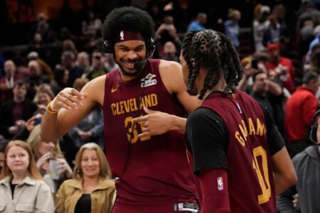 Cavaliers rally from 18-point deficit, clinch Central Division with 109-104 win over Nets