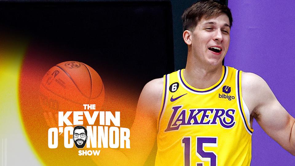 Austin Reaves #15 of the Los Angeles Lakers smiles on the baseline. Reaves has stepped up for the Lakers in a big way in their most recent NBA games. (Photo by Ronald Martinez/Getty Images)