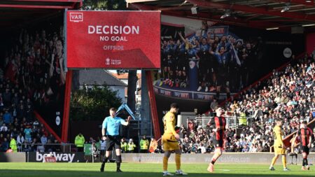 ‘This is embarrassing’ – Bournemouth vs Wolves hit with huge VAR delay as ref forced to hold conference on touchline