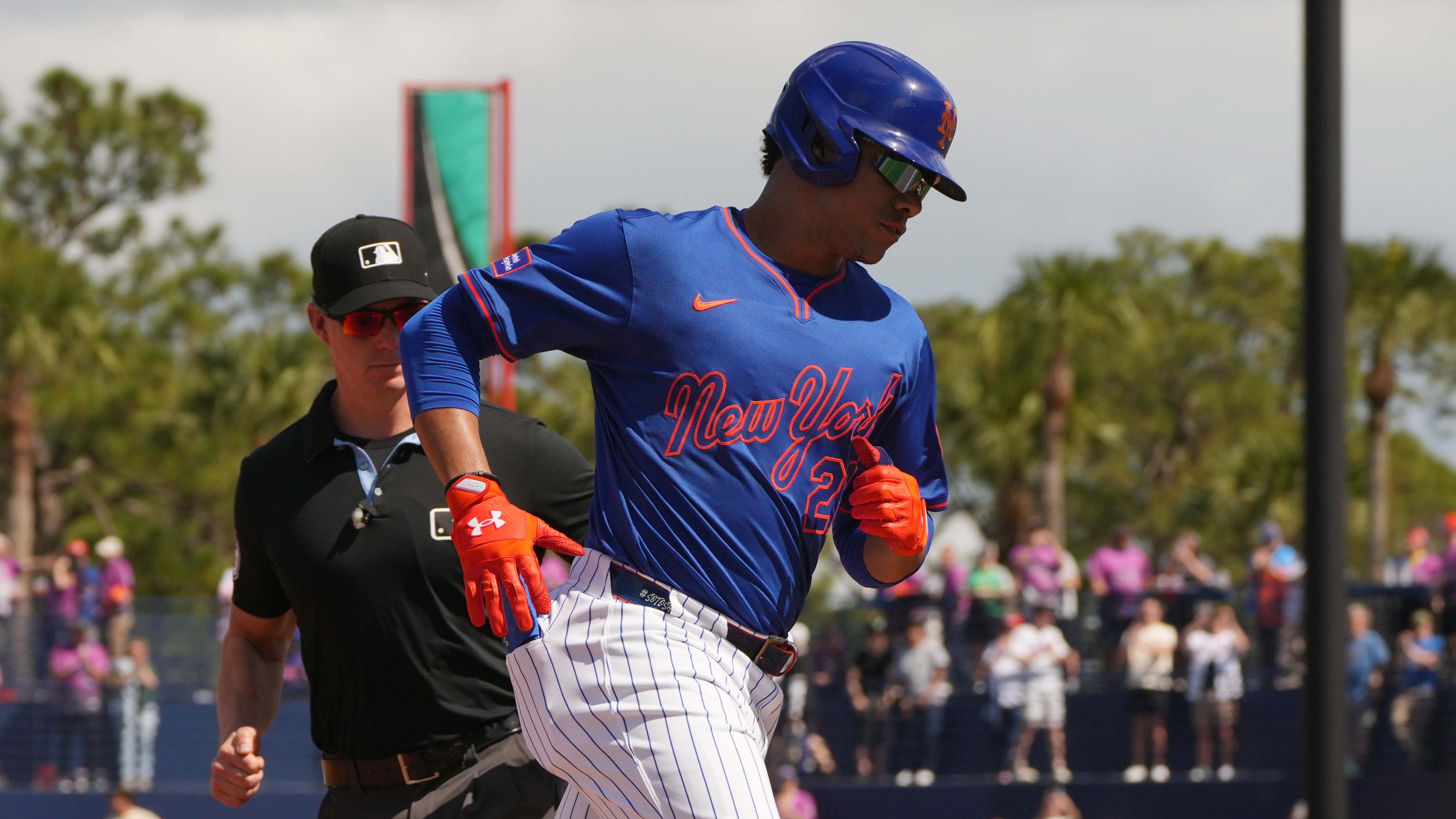 Port St. Lucie, Florida, USA; New York Mets outfielder Juan Soto (22) rounds the bases after hitting a home run in his first at-bat for the Mets against the Houston Astros in the first inning at Clover Park. 