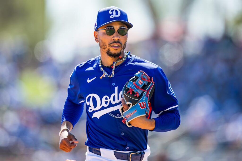 Dodgers manager Dave Roberts expects Mookie Betts to play in opener as he fights undiagnosed stomach illness