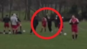 Moment football player is smacked over his head by ‘wife after cheating on her’ causing chaos at Sunday league game