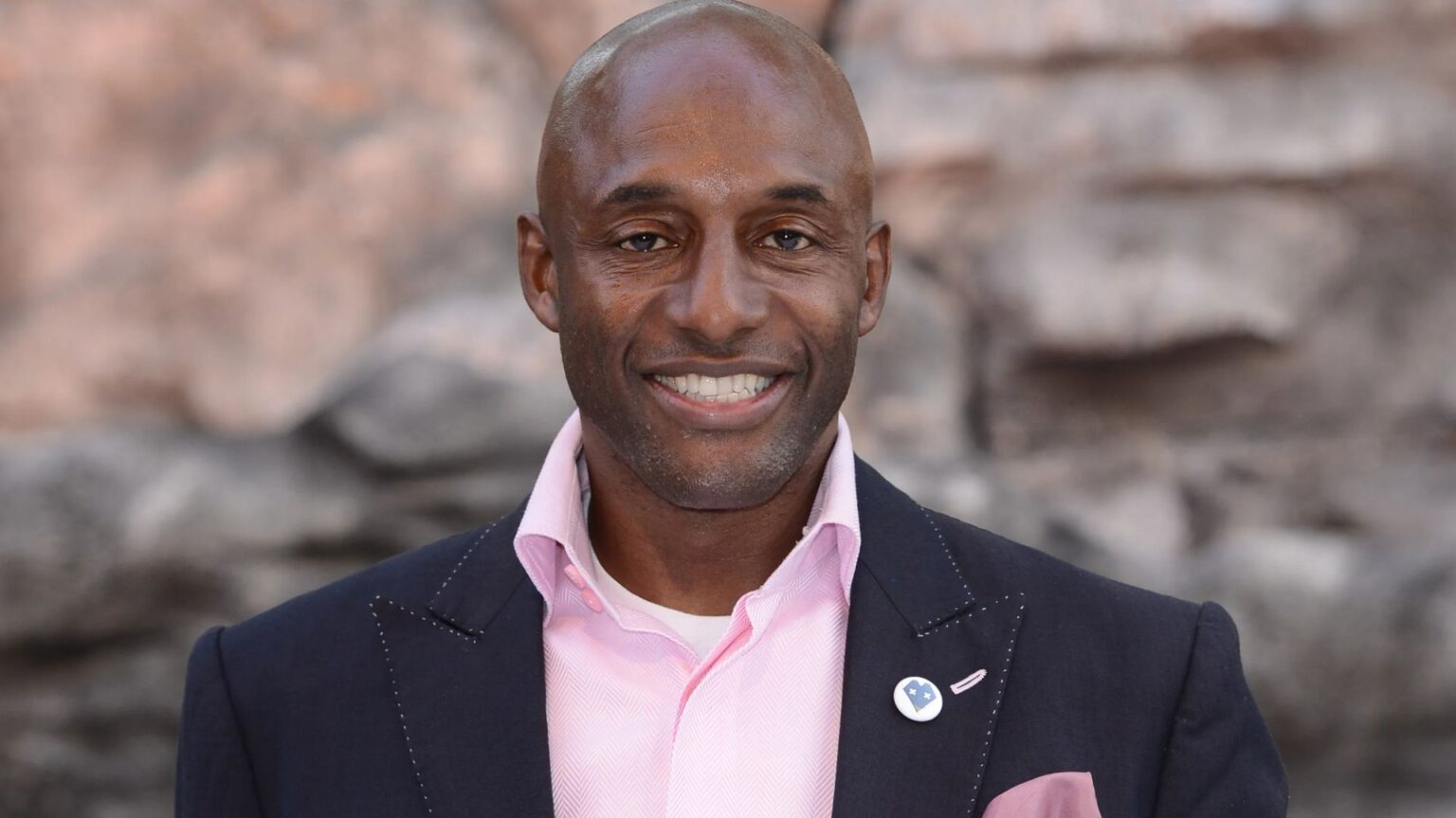 Ex-England and Gladiators star John Fashanu arrested on suspicion of ‘five crimes’ as he sues cops for £100k