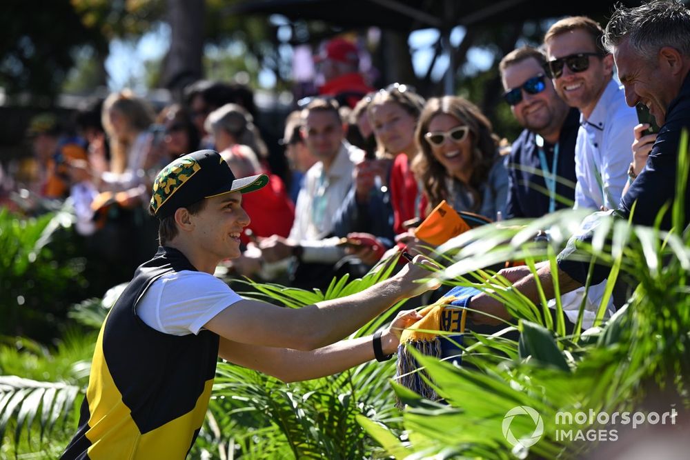 Oscar Piastri, McLaren F1 Team, signs autographs for fans 