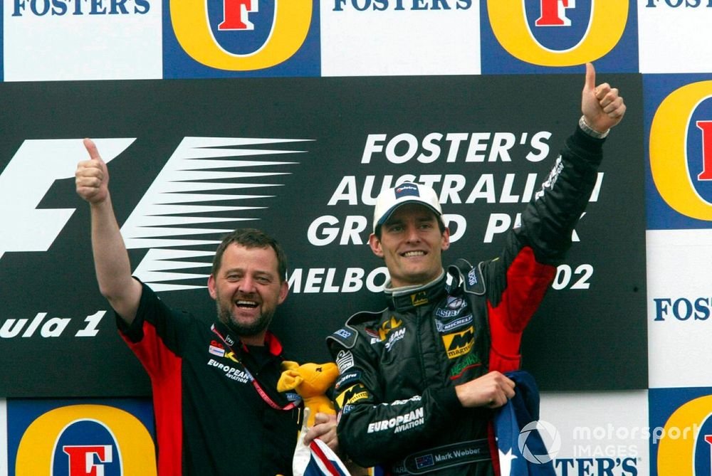 Paul Stoddart and Mark Webber celebrate in front of their home crowd