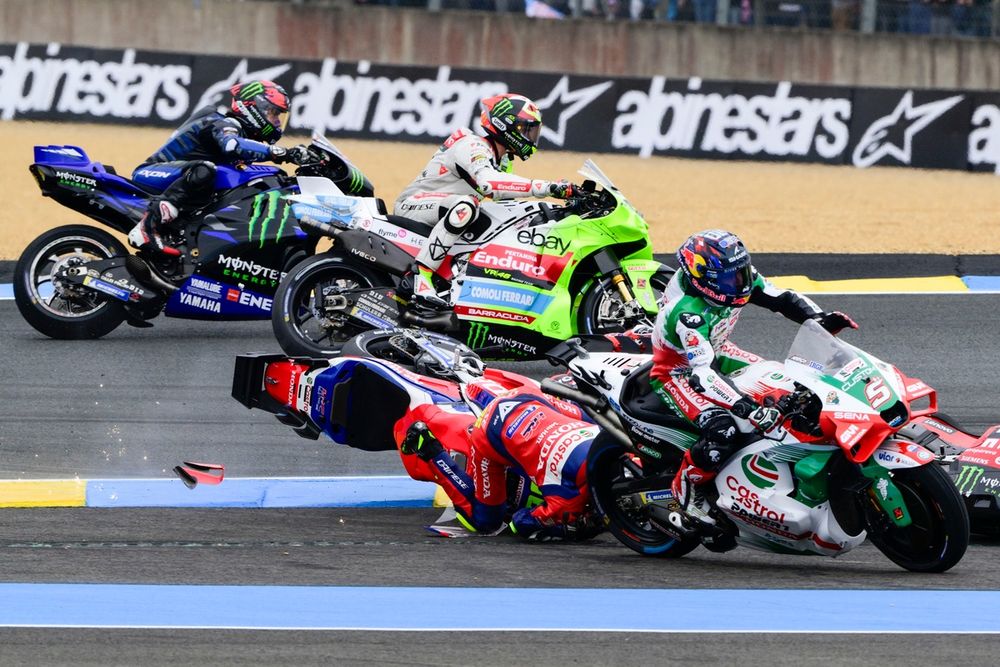 Bagnaia is taken down by Bastianini which triggers a chain reaction as Zarco narrowly avoids also going down