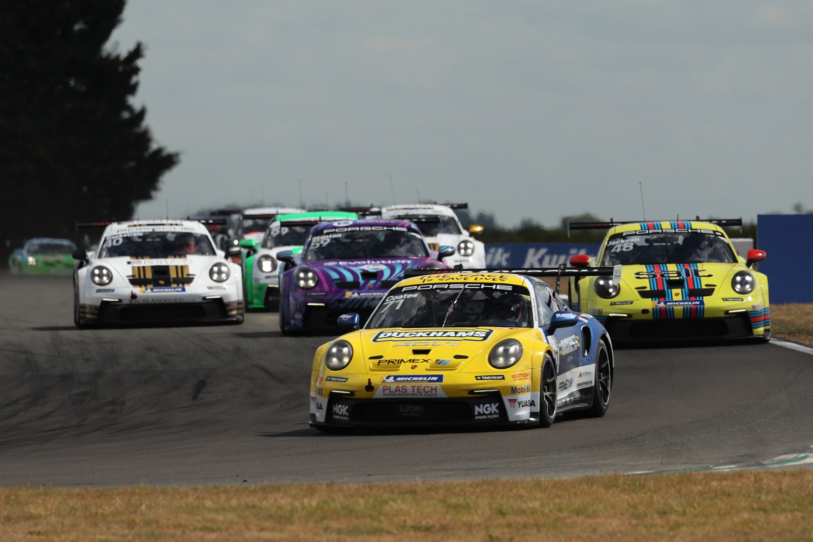 Coates scored a maiden Carrera Cup win in race two as he headed an all Pro-Am podium