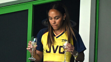 Alex Scott shows off midriff in retro Arsenal kit and sips bubbly with Jess Glynne at Women’s Champions League final