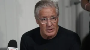 Raiders massive 6’6, 348-pound rookie goes viral for making Pete Carroll look tiny