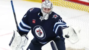 Jets goalie Connor Hellebuyck has something horribly wrong with him, and Blues fans chant to let him know
