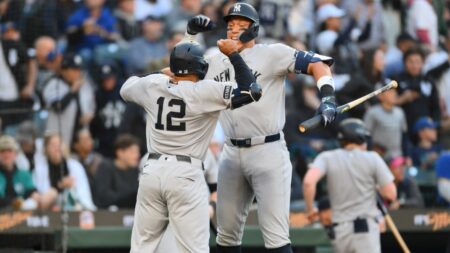Yankees homer four times, open series with 11-5 win over Mariners