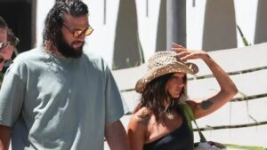 Andy Carroll and Lou Teasdale look loved up as pair walk hand-in-hand in Ibiza with pals saying he plans to propose